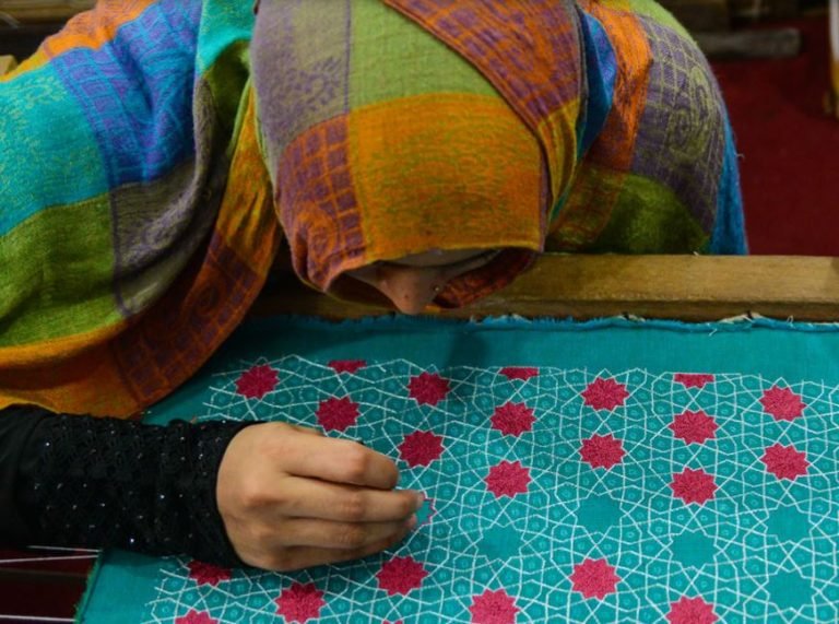 Lady doing traditional needlework